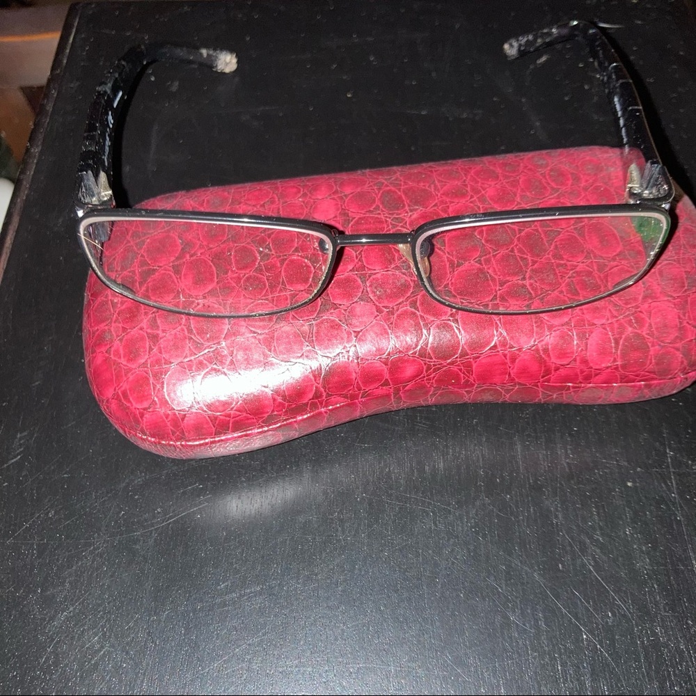 Black Vogue glasses with red case